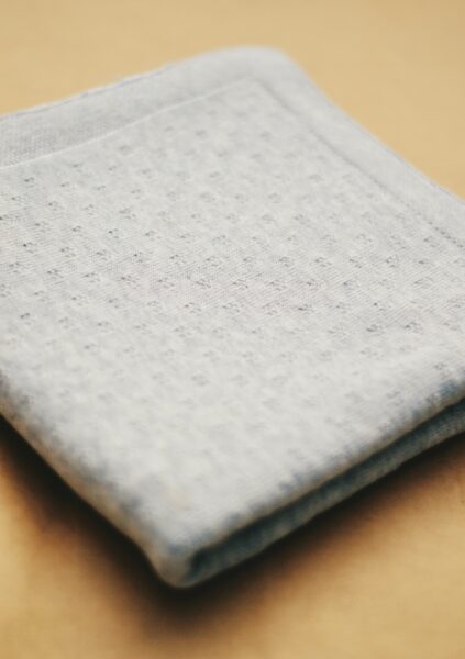 Grey cuddle blanket made from organic cotton for children